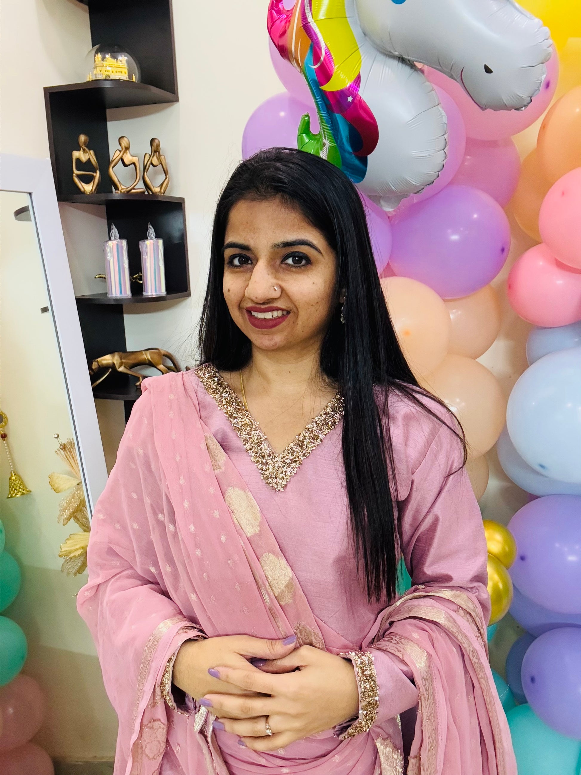 Onion pink raw silk suit set for women with delicate lace detailing, paired with matching pants and a Banarasi-inspired dupatta – perfect for festive and traditional occasions.